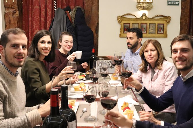 Iberian Ham and Wine Small Group Tour in Madrid - Second stop: Iberico ham, cheese, cold cuts, and two more pours
