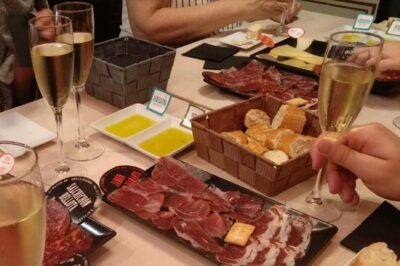Iberian Ham and Wine Small Group Tour in Madrid - First stop: Classic tapas plus two Spanish wines