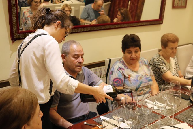 Iberian Ham and Wine Small Group Tour in Madrid - What you learn about Jamón Serrano vs Jamón Iberico