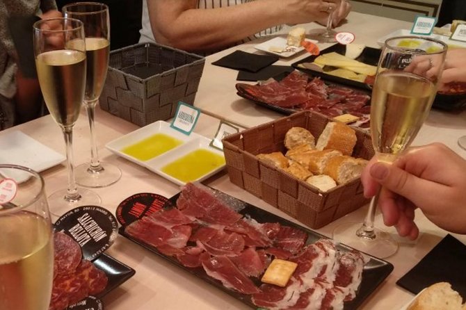 Iberian Ham and Wine Small Group Tour in Madrid - First stop: Classic tapas plus two Spanish wines
