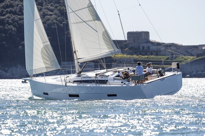 Ibiza Midday or Sunset Sailing with Light Snacks and Open Bar - Illa Sa Conillera and the calas: seeing Ibiza from sea level
