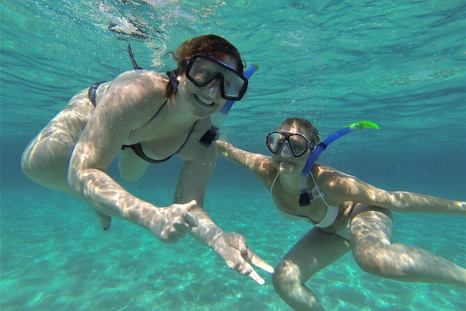 Ibiza Snorkeling Beach and Cave Tour - Stop 1: San Antonio Bay Swim Stops and Your First SUP Turns