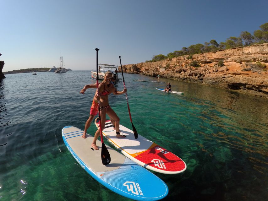 Ibiza: SUP & Snorkel Boat Tour with Caves, Drinks & Photos - Guided coves and natural sea caves: why the route changes