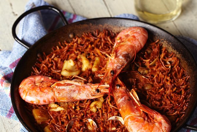 Interactive Paella & Market: Bottomless Wine & Rambla Views - Who Should Book This Paella & Market Class in Barcelona