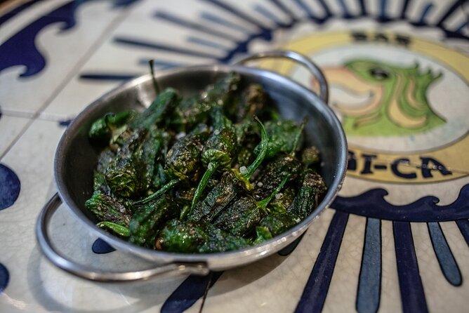 La Barceloneta Tapas & Wine & Drinks Tour in Barcelona - Bar Jai-Ca: tortilla, pa amb tomàquet, seafood, and padrón peppers