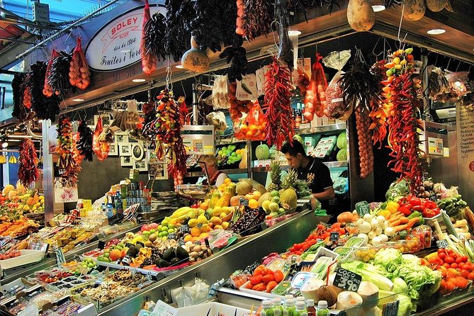 La Boqueria Market and Paella Cooking Class in Barcelona - The tapas tasting: 10 plates, wine pairings, and quick Spanish flavor education