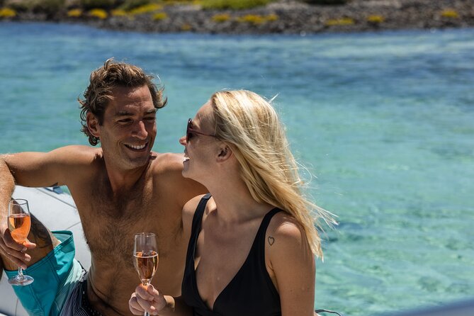 Lobos Island Half-Day Sailing Tour with Lunch - Playa de la Concha: swimming, snorkelling, kayaking, and paddle time