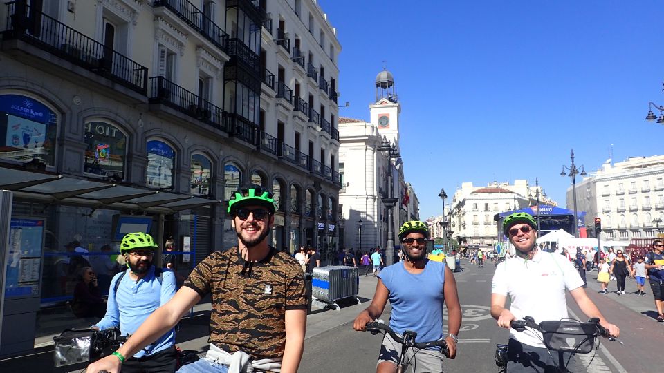 Madrid City Guided Bike/E-Bike Tour for Small Groups - Climbing into Retiro Park: boating lake, Cristal Palace, and rose season