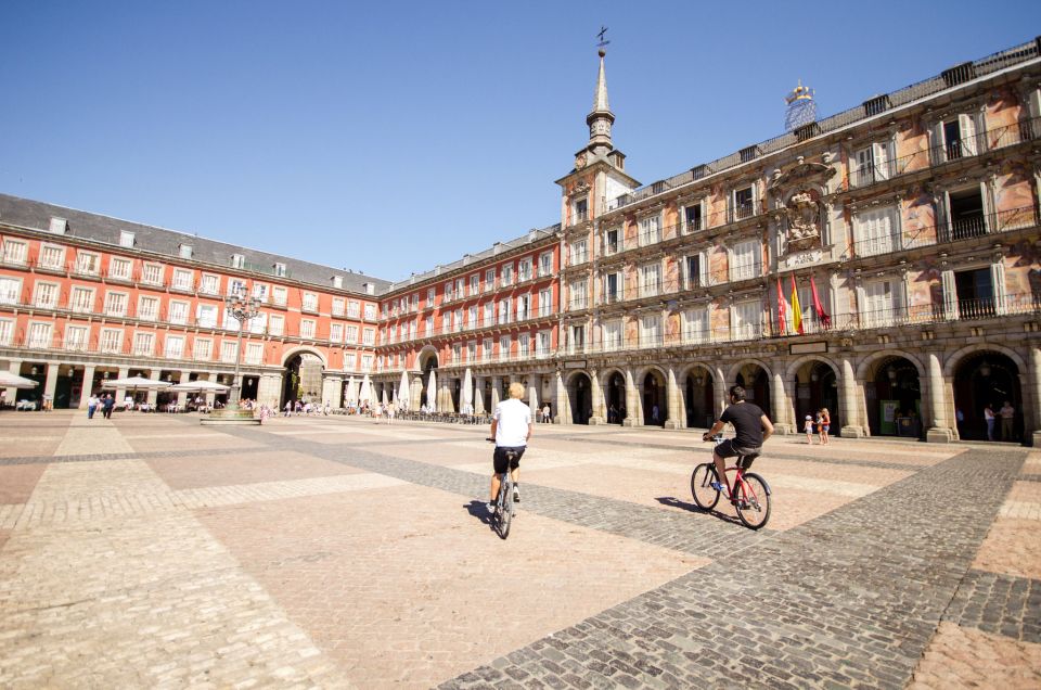 Madrid City Guided Bike/E-Bike Tour for Small Groups - Leaving the park via Alcalá Gate, then rolling to Chueca and Malasaña