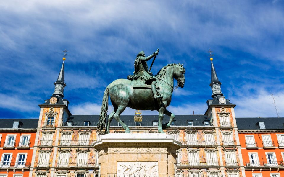 Madrid: City Highlights Guided Walking Tour - Royal Palace Exterior and Plaza de Oriente Statues