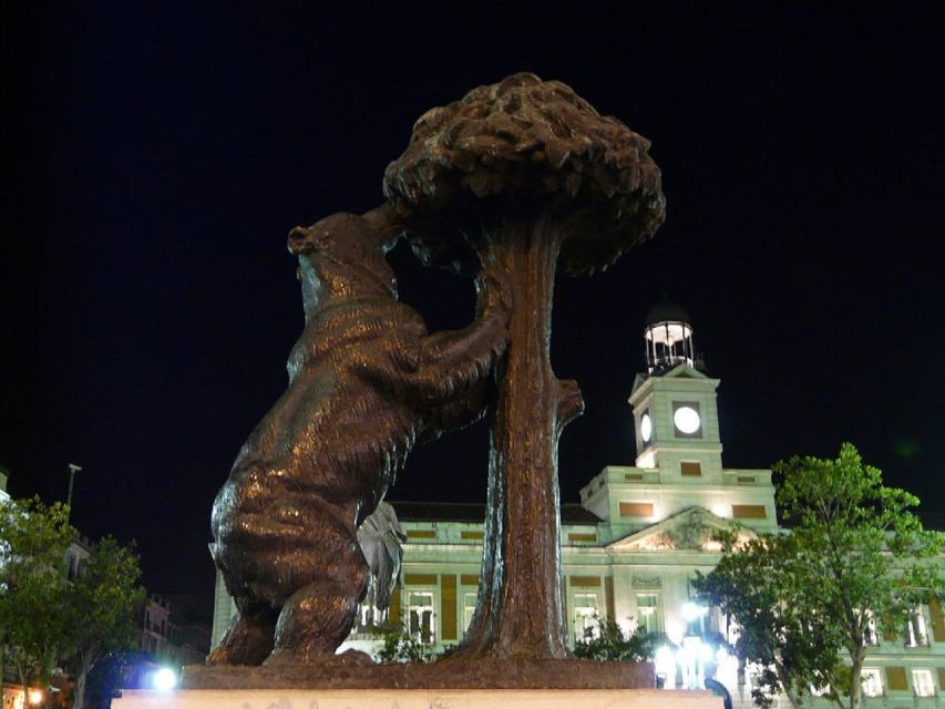 Madrid: Enchanted Evening Walking Tour in Spanish - Plaza Mayor: History Details That Stick After the Photo