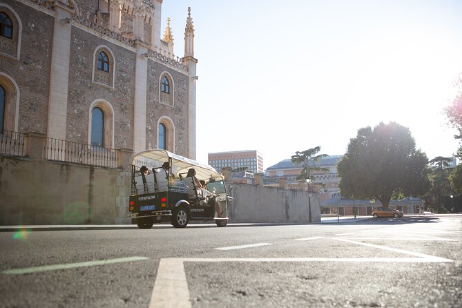 Madrid Expert Plus Tour with Local Guide in Eco Tuk Tuk Private - Parliament Area to Neptune Fountain: Neoclassical Madrid in Motion