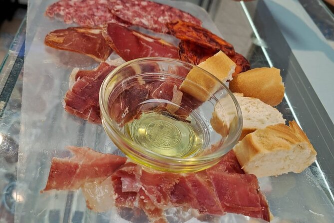 Madrid Food Tour: Tapas, Drinks and Delights with a Local - Stop 2: tortilla de patatas near Jacinto Benavente