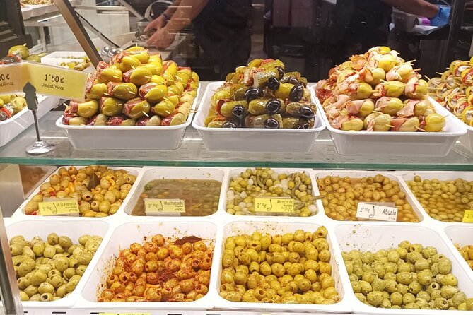 Madrid Food Tour: Tapas, Drinks and Delights with a Local - Stop 3: Plaza Mayor and the bocadillo de calamares