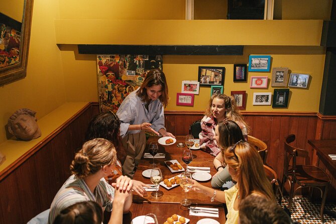 Madrid Food Walking Tour with Tapas and Vermouth - Calle de Toledo: squid-ink sandwich and Abuelo sweet wine