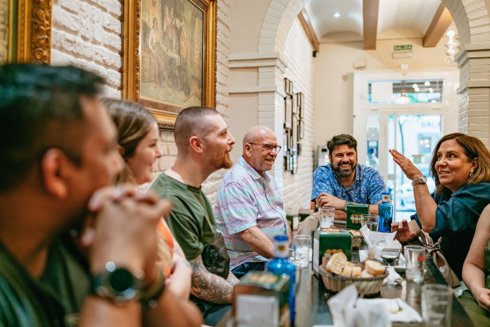 Madrid: Food & Wine Tour with 10 Tapas & 4 Drinks Included - Four Stops, Four Moods: Market Bites to Old Bodega Classics