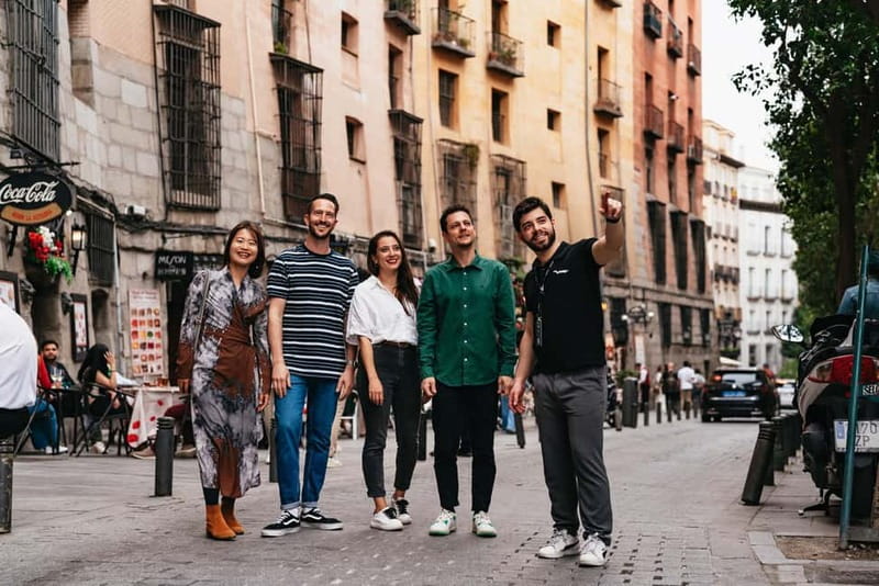 Madrid: Guided Tapas and Wine Tour with Rooftop Views - Ham, Iberian sausages, and wine pairing that actually has purpose