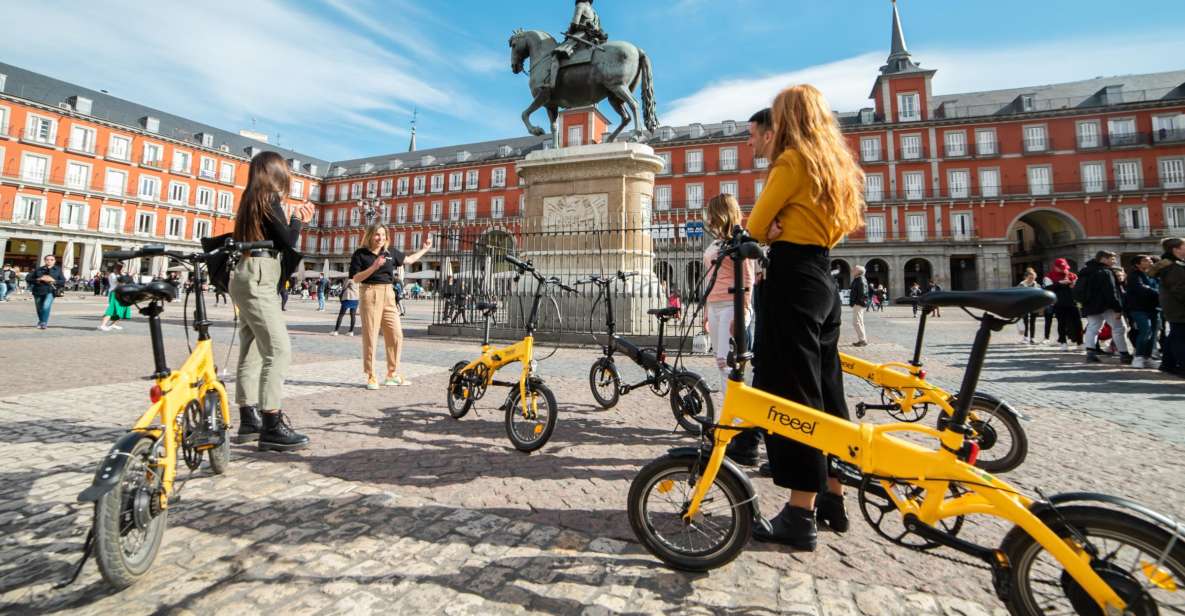 Madrid: Highlights & Parks with Electric Bike Private Tour - Plaza Mayor and Puerta del Sol: the heartbeats you’ll revisit later