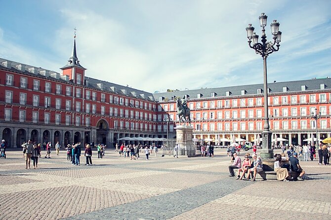 Madrid Historic Centre Food Tour with Authentic Tapas & Wines - Patatas bravas, tortilla, and peppers: the comfort-food core