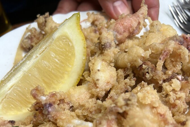 Madrid Local Tapas Tour with Private Dinner and Bottomless Wine - Mercado de Anton Martin: Vermouth Culture and the Gilda Pintxo