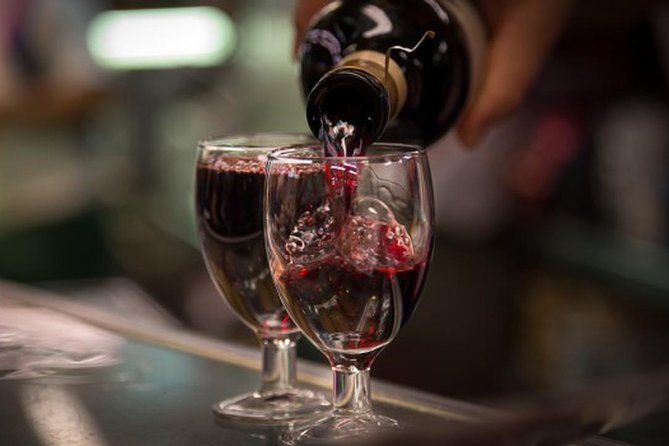 Madrid Local's Wine and Tapas Lunch Tour with a side of History - Plaza de Isabel II: your first pour and classic Madrid croquetas