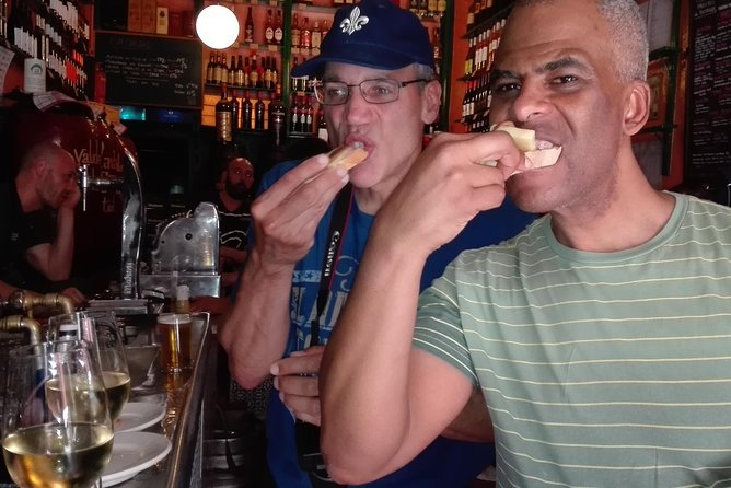 Madrid Local's Wine and Tapas Lunch Tour with a side of History - What you’ll actually eat: croquetas, pinchos/tostas, and huevos estrallados