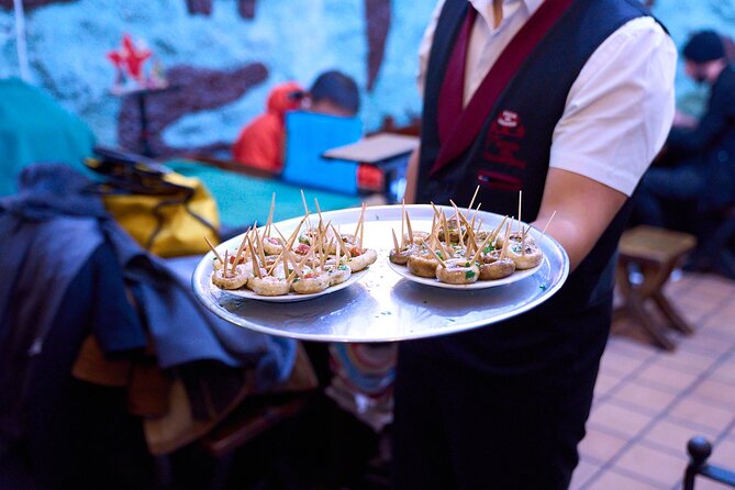 Madrid: Not Just Another Tapas & Wine Tour by Eating Europe - Stop-by-stop: from historic corners to famous tapas rooms