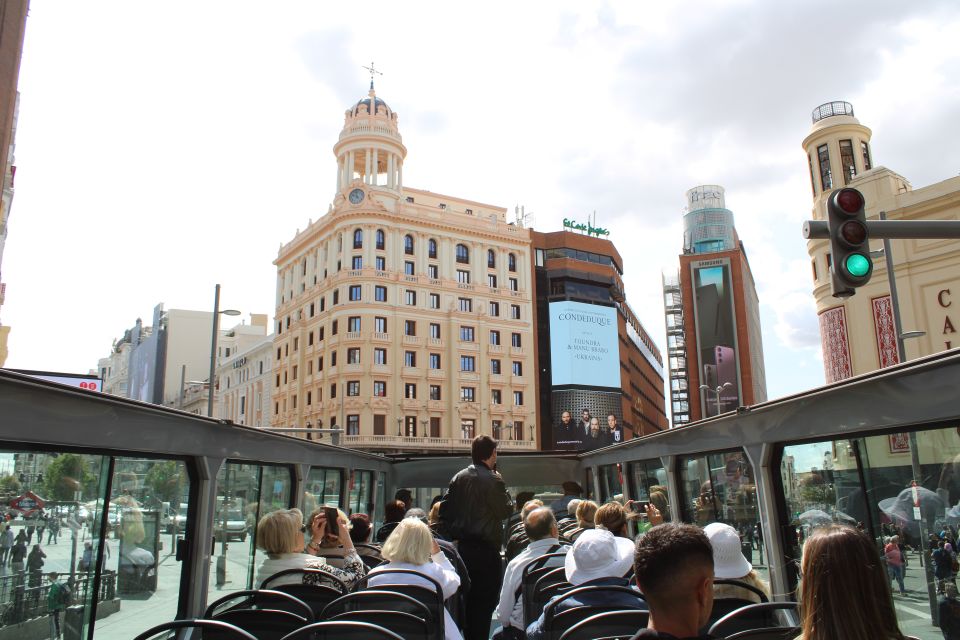 Madrid: Open-Top Big Bus Sightseeing Tour with Live Guide - Prado to Atocha: Museums and Transit in Real Context