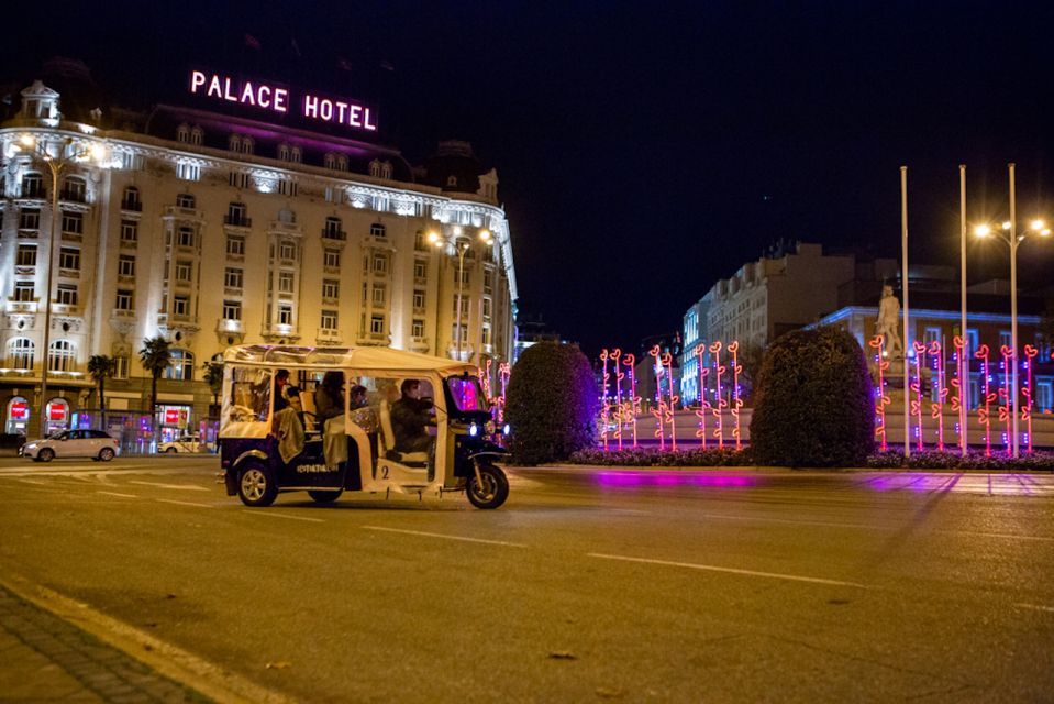 Madrid: Private Christmas Lights Tour by Eco Tuk-Tuk - Salamanca and Retiro streets: shopping districts, elegant façades, and holiday atmosphere