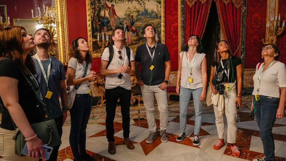 Madrid: Royal Palace Guided Tour with Entry Ticket - Crowds, photos, and headset issues: how to enjoy anyway