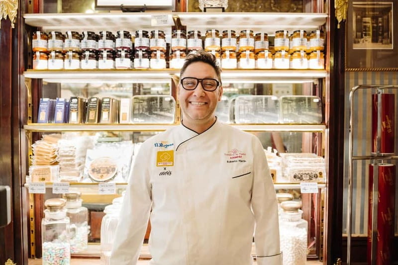 Madrid: Ultimate Food Tour of Local Markets & Tapas - Mercado de Antón Martín: olives, cured meats, olive oil, and red vermouth