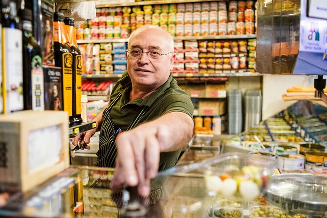 Madrid Ultimate Spanish Cuisine Food Tour - Casa González Deli: Cheese Stories and Two Wines