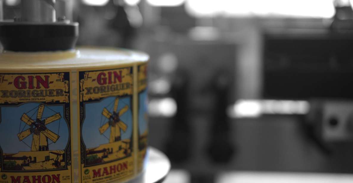 Mahón: Gin Distillery Tour with Tasting & Appetizers - Degustation time: tasting the gin with Menorca sausages, cheese, and sweets