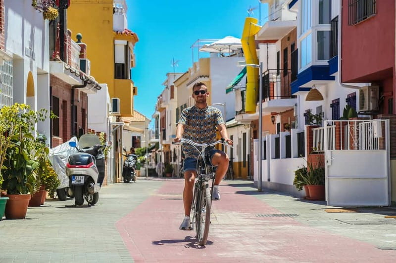 Malaga: Castle Hill and Fisherman Village E-Bike Tour - Gibralfaro fortress climb: the payoff view that sets the whole day