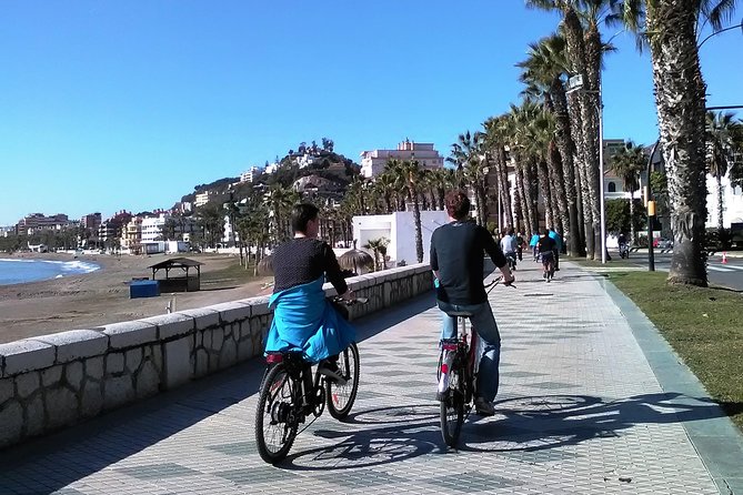 Malaga Electric Bikes Guided Tour - Alcazaba walls, beaches, and the port finale near Muelle Uno