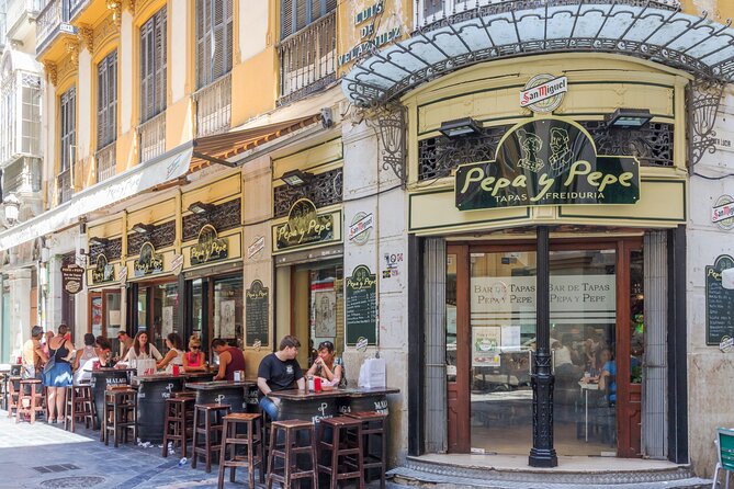 Malaga Market Food Tour: Tapas, Drinks, and Local Flavors - Plaza de la Merced (Stop 4): Roman-era square and Andalusian classics