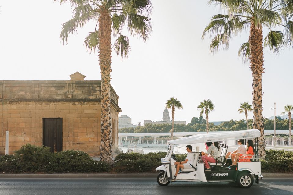 Malaga: Private City Tour by Eco Tuk Tuk - How the 1-hour and 2-hour options change what you get