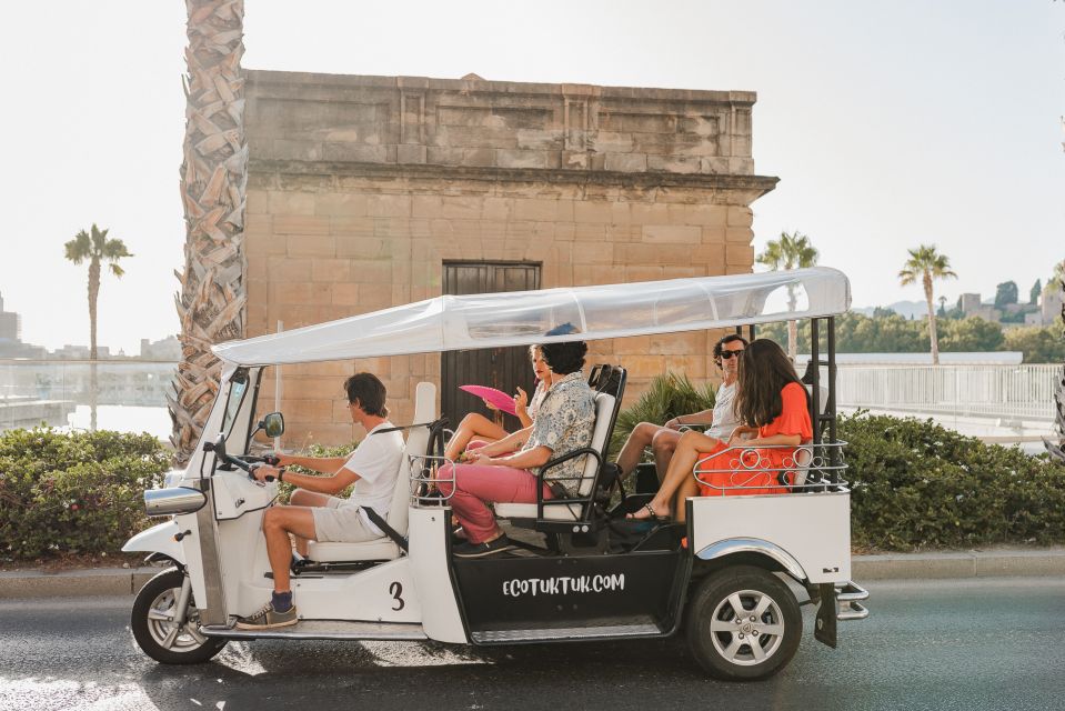 Malaga: Private City Tour by Eco Tuk Tuk - Comfort and weather: rain won’t fully ruin the plan