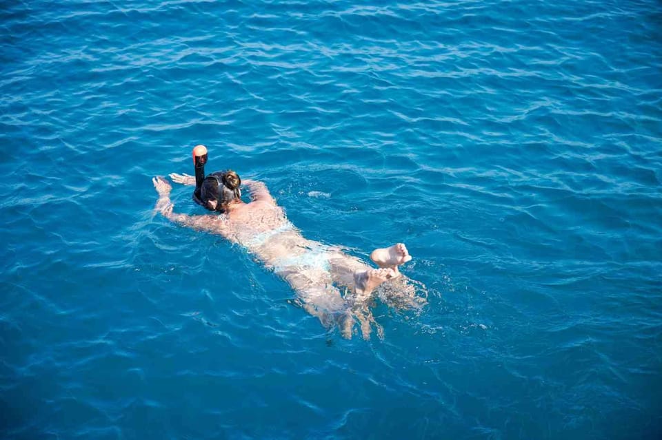 Malaga: Sailing Catamaran with Swimming and Paella Lunch - Open-Sea Swim Stops: Time to Snorkel Without the Beach Hassle