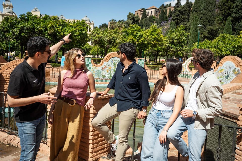 Málaga: Tapas, Wine & Rooftops Private Tour - Walking Malaga with purpose: Cathedral views, port energy, and quick history