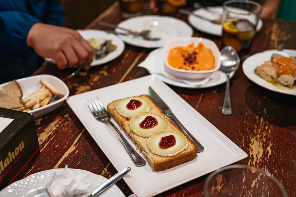 Málaga: Traditional Andalusian Tapas and Wine Tour - The first pour at a 200-year-old winery: what you’ll learn from the grapes