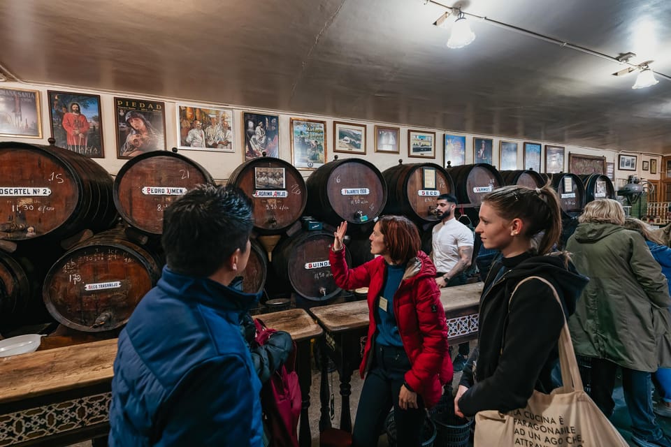 Málaga: Traditional Andalusian Tapas and Wine Tour - Stop for homemade tapas at a long-running local restaurant
