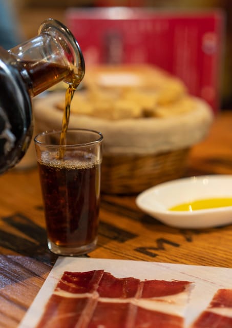 Málaga: Wine & Tapas Tour - First stop: Calle Marqués de Larios and a fast city orientation