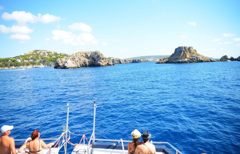 Mallorca: 2-Hour Coastline & Malgrat Islands Catamaran Tour - Onboard Comfort, Toilets, Music, and What You Can Buy