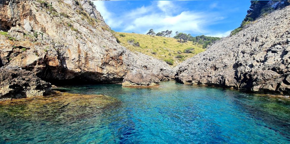 Mallorca Alcudia: Jack Sparrow Cave Jet Ski Tour - Jack Sparrow’s Cave at Aucanada: rock formations and the snorkel approach