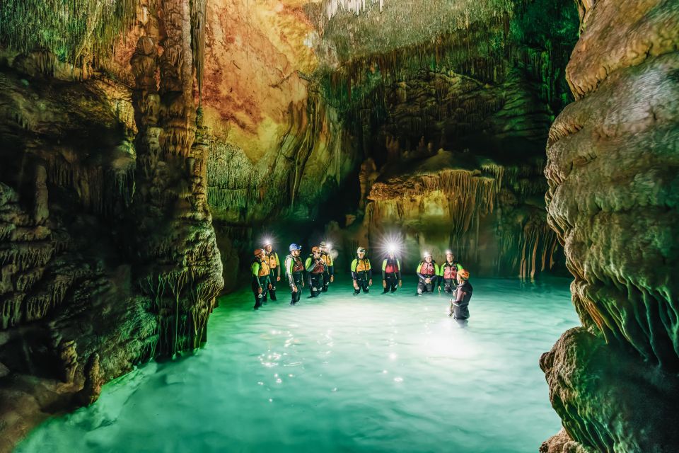 Mallorca: Cova des Coloms Caving Trip with Hotel Transfer - Inside the cave: formations, vertical sections, and natural pools