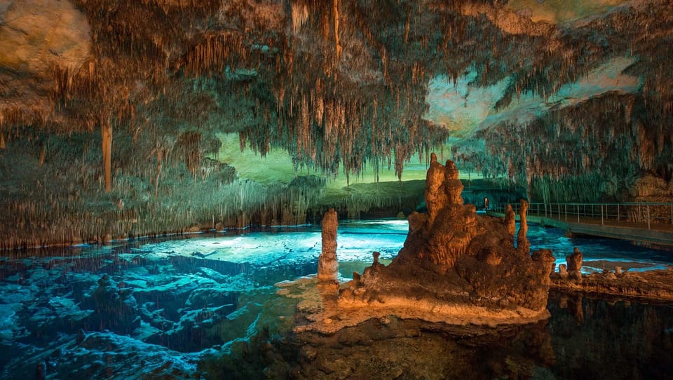 Mallorca: Drach and Hams Caves, and Porto Cristo Day Tour - Coves del Drach and Lake Martel: bigger chambers, live classical music, and 21°C comfort