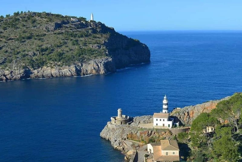 Mallorca: Full-Day Island Tour by Train, Tram, and Boat - Cuber and Gorg Blau Lakes: emerald water with big mountain views