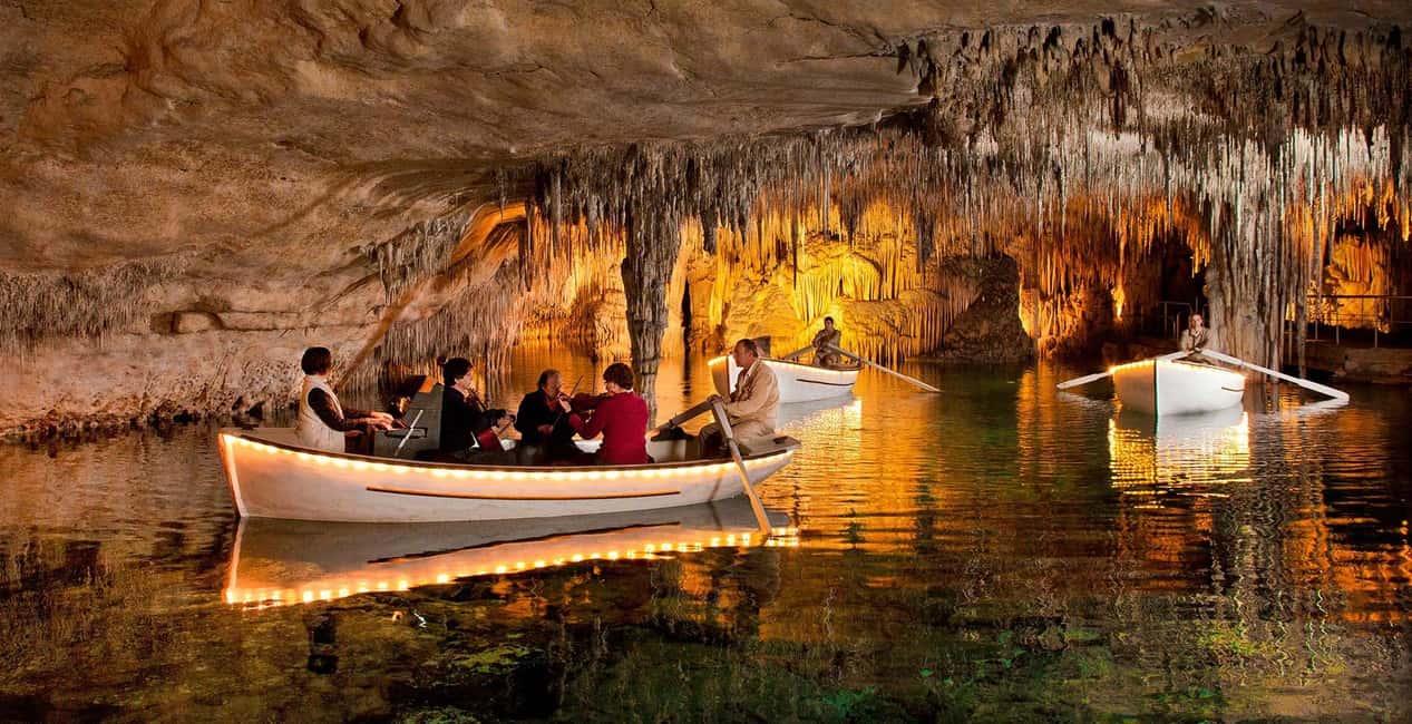Mallorca: Half-day of Natural Wonders at the Drach Caves - The Martel Lake boat ride: where the caves turn into a show