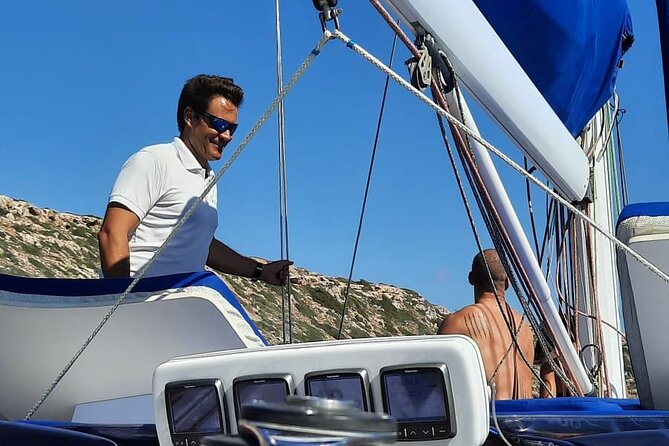 Mallorca Sailing Adventure with Snorkeling, Snacks & Drinks - Captain-led day: sailing experience plus a relaxed host style